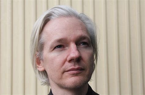 what was julian assange accused of